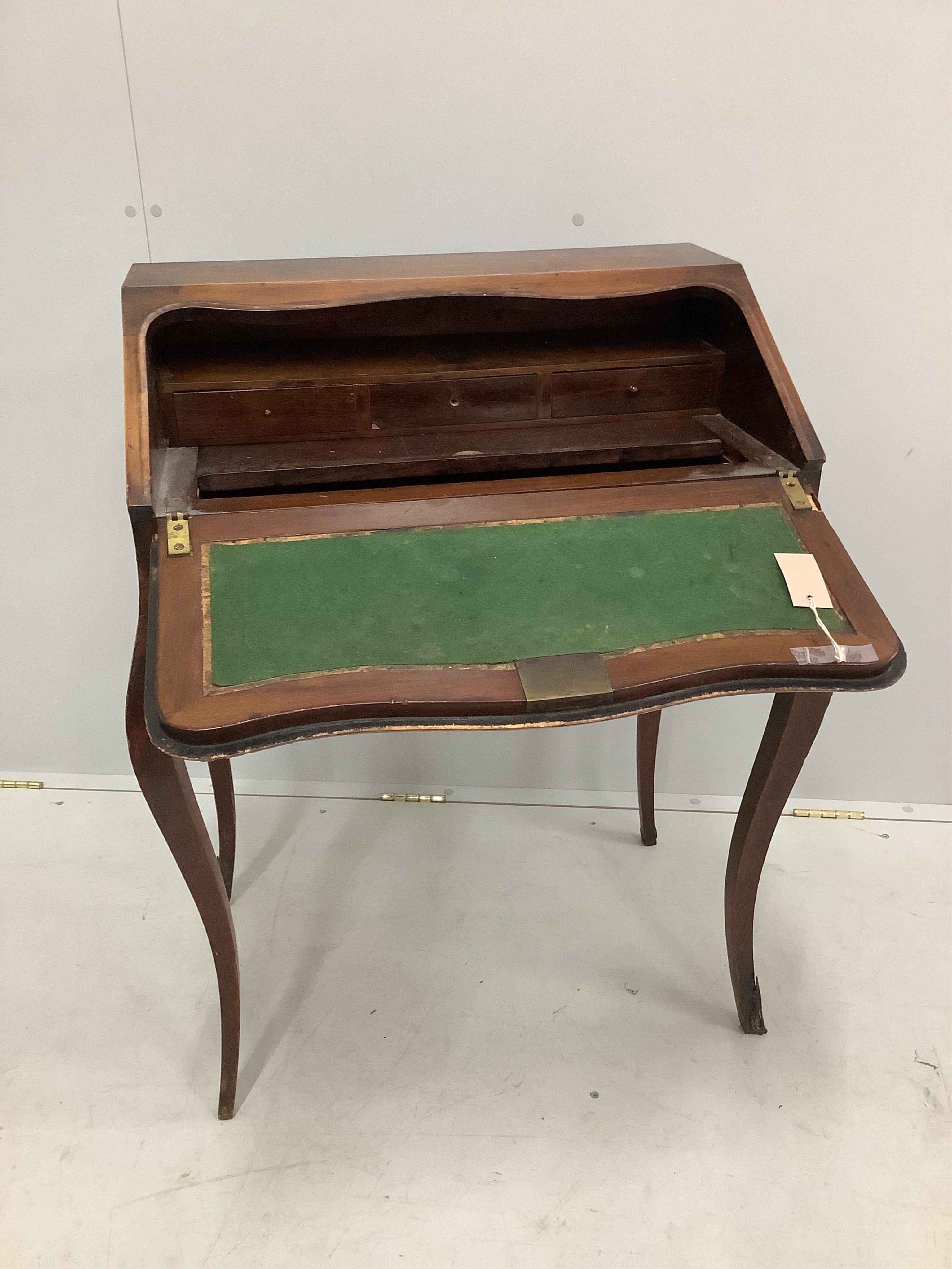 A Louis XV style floral marquetry inlaid bureau de dame, width 65cm, depth 43cm, height 89cm. Condition - fair